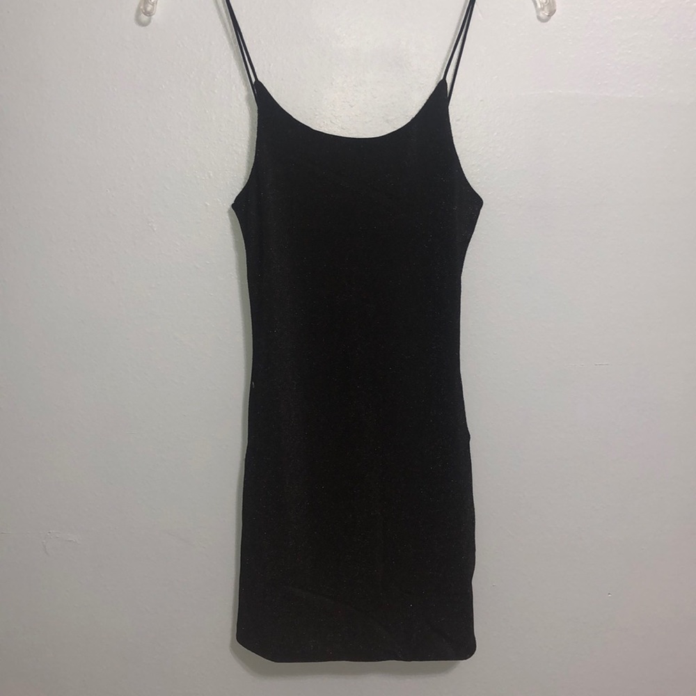 Lighting in a box black mini dress